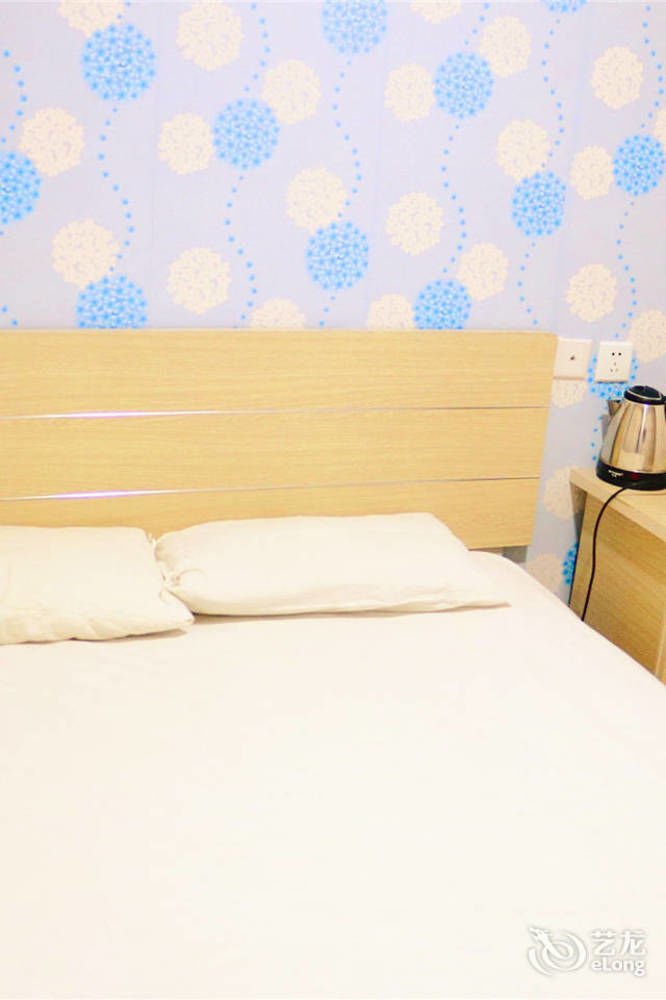 Qingdao Peninsula Four Seasons Business Hotel Zewnętrze zdjęcie